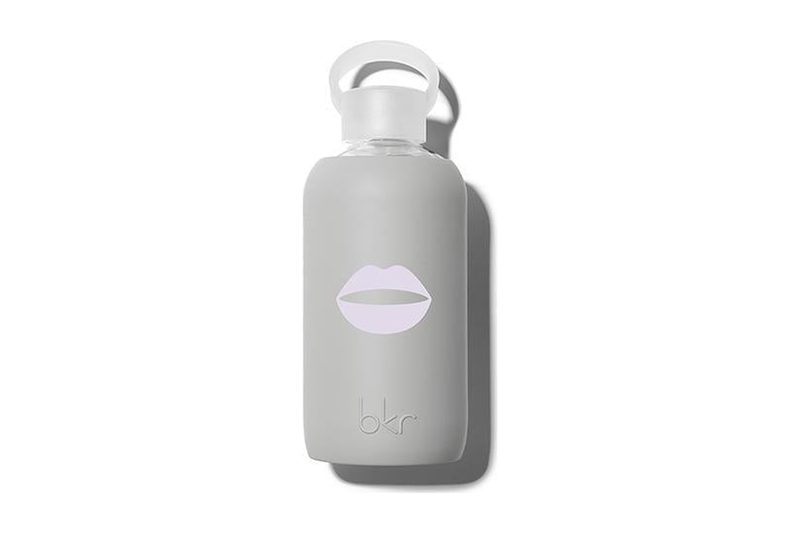 bkr Little 500 ml glass water bottle in a grey silicone sleeve with a lilac lips print