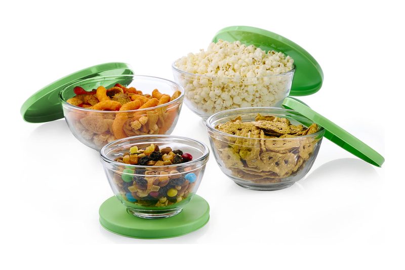 Libbey glass bowls filled with snacks, with green plastic lids